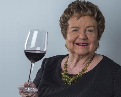 Isabel Mijares with a glass
