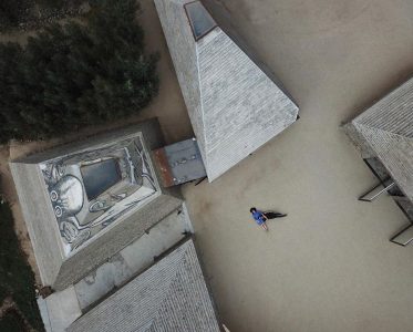 A Monastery of Stone and Second-Life Materials